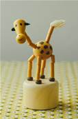 Figure  presser en bois Girafe