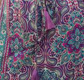 Pantalon large resserré aux chevilles fleuri violet