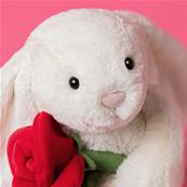 Peluche lapin avec une rose dans les bras Jellycat