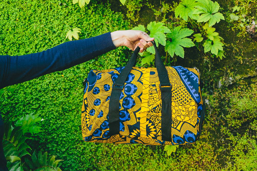 Sac de voyage en tissus wax africain jaune motifs bleus