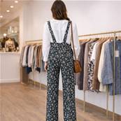 Salopette velours bleu marine à motifs fleuris