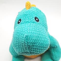Peluche dinosaure turquoise
