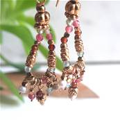 Boucles d'oreilles crochet fleur perlé ovale pampilles