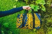 Sac de voyage en tissus wax africain jaune motifs bleus