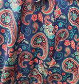 Pantalon large resserré aux chevilles fleuri bleu et rouge
