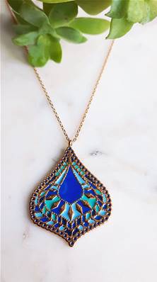 Collier doré motif arabesque Osiris