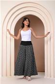 Pantalon extra large CHIZU noir et motifs beige