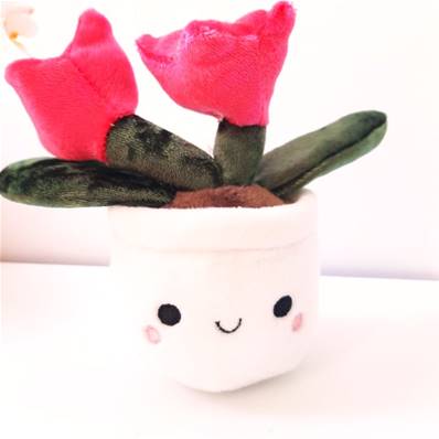 Peluche plante fleurie fluo