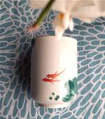 Tasse à thé 2poissons 10 cm x 7 cm