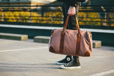 Sac de voyage à main et bandoulière cuir et coton marron 31x51cm