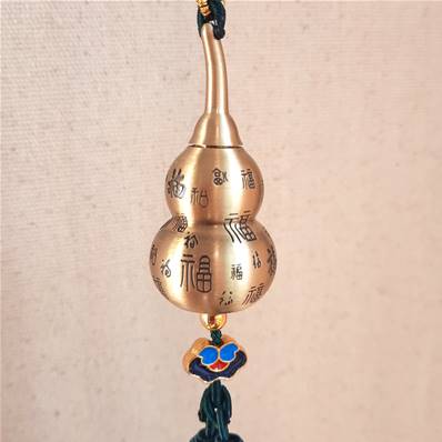 Porte-clé clochette en métal gravé avec motifs
