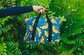 Sac de voyage en tissus wax africain turquoise fleur jaune