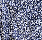 Pantalon large resserré aux chevilles fleuri bleu et blanc
