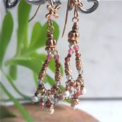 Boucles d'oreilles crochet fleur perlé ovale pampilles